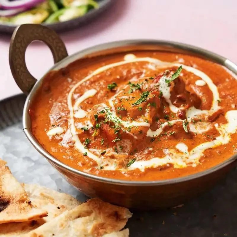 Creamy Butter Chicken at The Mango Tree — Most popular Indian dish in Medicine Hat, AB